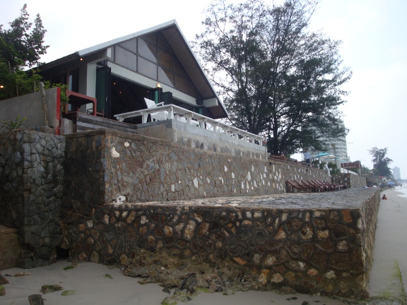 There were now beach bars appearing, where I could seek shelter from the rain, but by now, I was already wet.