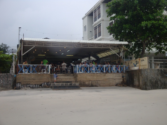 There were now beach bars appearing, where I could seek shelter from the rain, but by now, I was already wet.