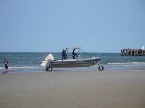 lowered its wheels and started driving around the beach