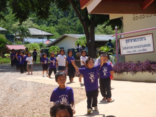 the first wave of kids coming down the hill