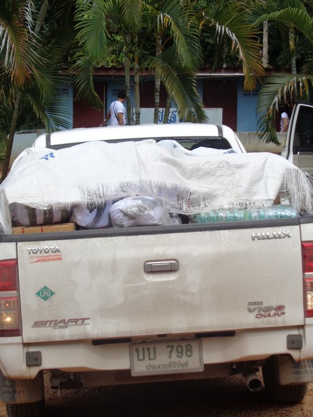 The final load carrying car was loaded with the shoes, sandals, socks and blankets