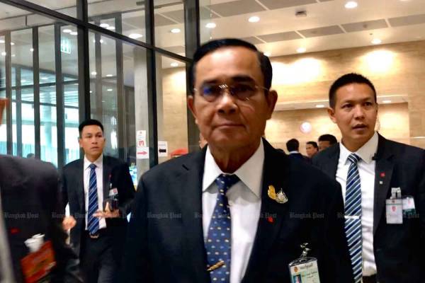 Prime Minister Prayut Chan-o-cha arrives at the parliament in Bangkok on Thursday. (Photo by Wassana Nanuam)