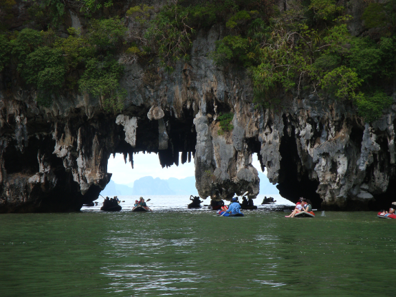 canoe through a mangrove forest, and through a cave.