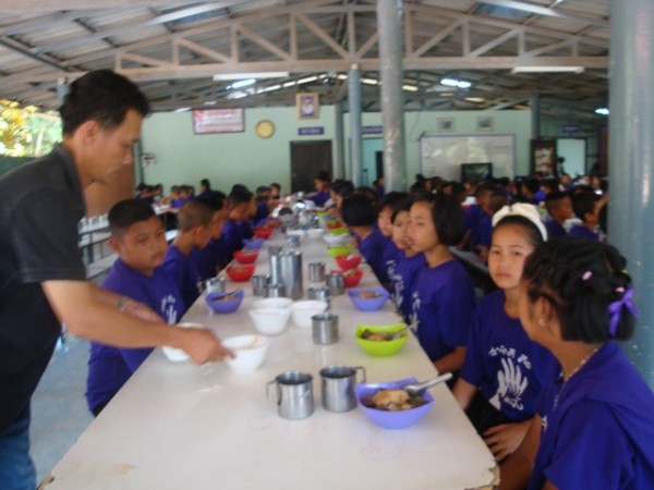 They all sat down, and food was placed in front of each child.