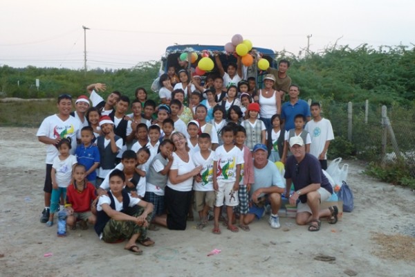 A group photo of kids and helpers at the end of a wonderful day: