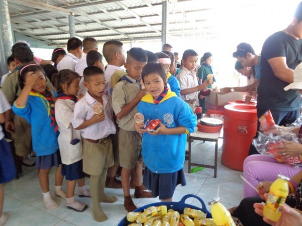 the older kids now queued up for treats.
