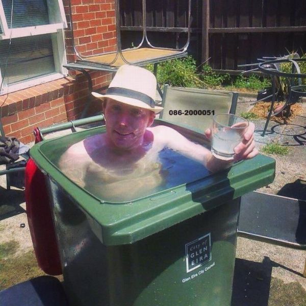 UK-summer-guy-bin-filled-with-water-13716618604.jpg