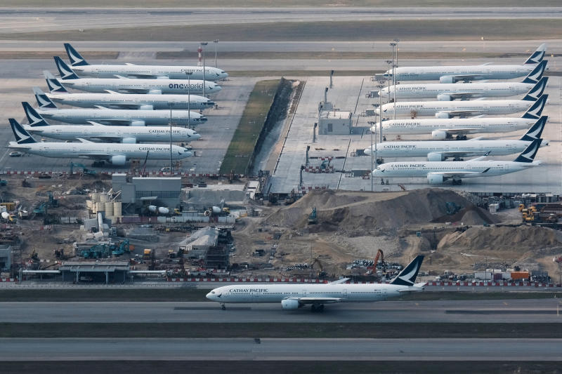 Cathay Pacific aircraft are seen parked on the tarmac at Hong Kong International Airport on March 5, 2020. (Reuters photo)